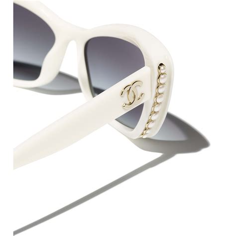 chanel black and white rimmed sunglasses|chanel sunglasses with chain 2022.